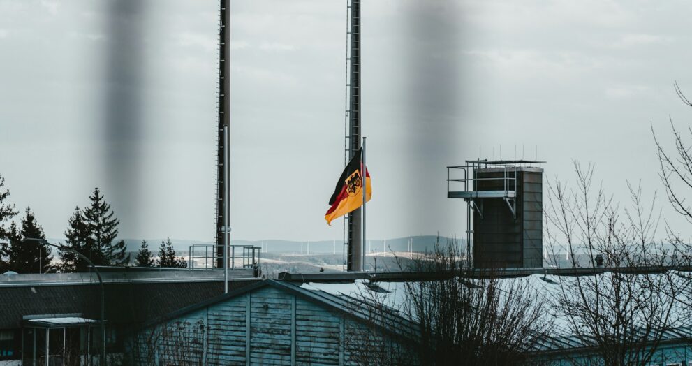 black and yellow flag on top of building